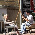 San Marino - artysta uliczny - portrecista przy pracy.
