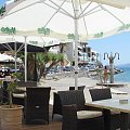 tawerny w porcie Agios Nikolaos nad zatoką Mirambellou na Krecie #Kreta #wyspa #morze #zatoka #Mirambellou #jezioro #slodkie #Voulismeni #kaczki #ocean #wakacje #kolory #odbicia #jachty